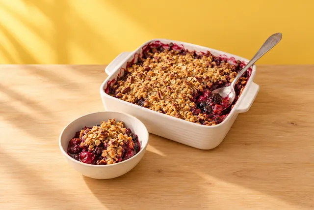 Mixed berry crisp in a baking dish